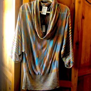 Long 70’s inspired cowl neck top.